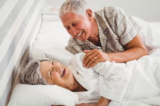 Old couple in bed